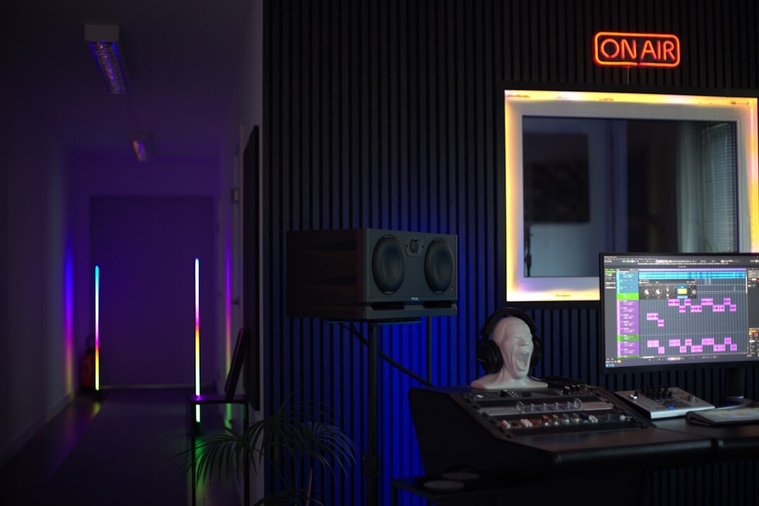 Professional radio broadcasting studio with microphones and mixing board