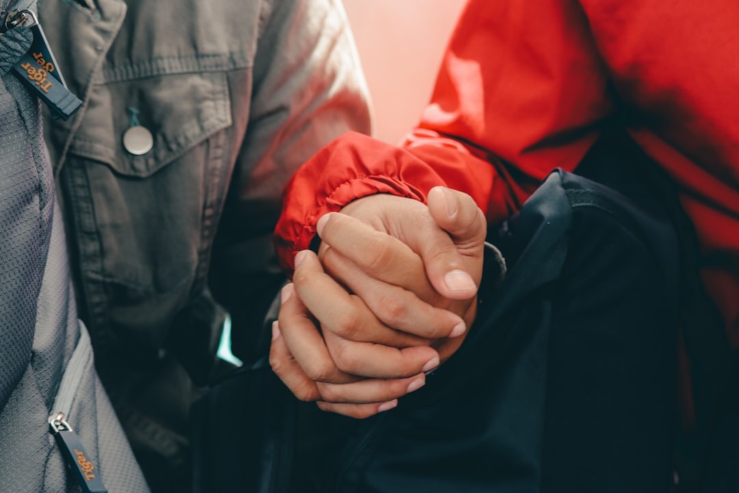 Two journalists shaking hands representing trust and partnership